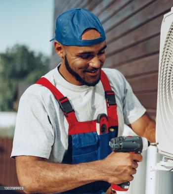 Technician installing a ductless system in Sterling VA